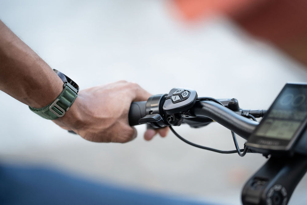 Close up of the throttle on the Priority Current Plus E-Bike.